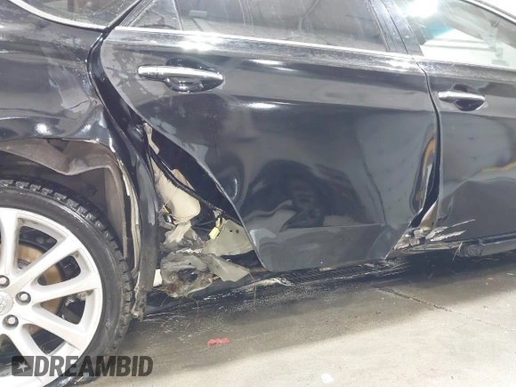 2015 Toyota Avalon Limited with VIN 4T1BK1EB6FU176700, listed as a IAAI auction lot 41182880 with 104,830 mi miles and . Bid and sale history available at DreamBid. Image 6.