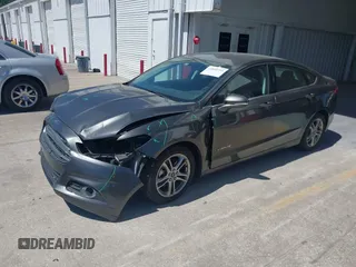 2016 Ford Fusion SE Hybrid with VIN 3FA6P0LU3GR127121, listed as a IAAI auction lot 41840795 with 88,281 mi miles. Bid and sale history available at carsss.com. Image 18.