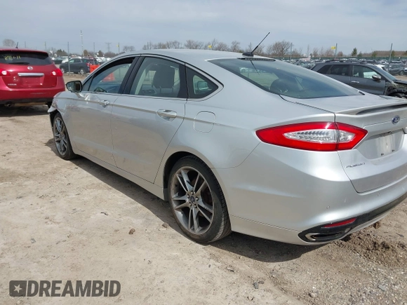 2014 Ford Fusion Titanium with VIN 3FA6P0K93ER163045, listed as a IAAI auction lot 42023862 with 171,543 mi miles. Bid and sale history available at carsss.com. Image 3.