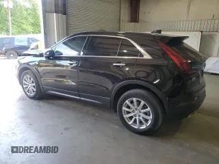 2022 Cadillac XT4 FWD Luxury z VIN 1GYAZAR45NF124737, wystawiony jako Copart lot #53164135 z przebiegiem 41 344 mil mil oraz Szkoda całkowita • Salvage title. Historia ofert i sprzedaży dostępna na DreamBid. Obrazek 2.