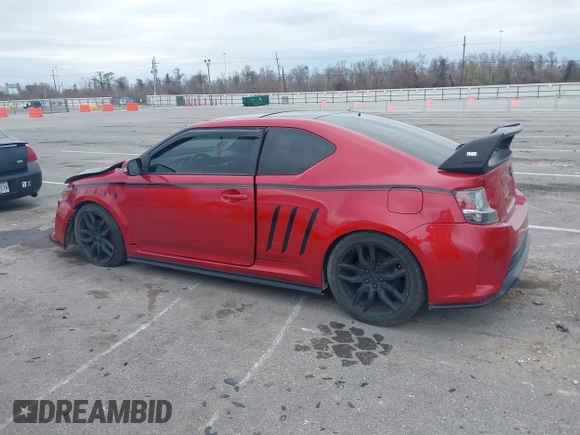 2016 Scion tC with VIN JTKJF5C74GJ026588, listed as a IAAI auction lot 41582253 with 74,023 mi miles. Bid and sale history available at carsss.com. Image 14.