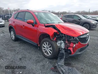 2015 Mazda CX-5 Touring with VIN JM3KE2CY7F0533731, listed as a IAAI auction lot 41876211 with 1 mi miles. Bid and sale history available at carsss.com. Image 1.
