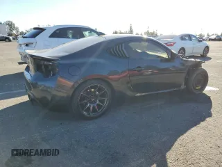 2017 Toyota 86 with VIN JF1ZNAA13H9706267, listed as a Copart auction lot 87099494 with 91,137 mi miles and Salvage Title. Bid and sale history available at carsss.com. Image 3.