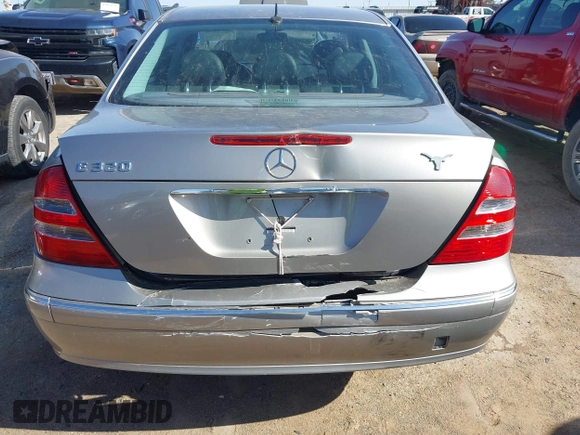 2003 Mercedes-Benz E-Class 3.2L with VIN WDBUF65J63A315547, listed as a IAAI auction lot 41979639 with 106,844 mi miles. Bid and sale history available at carsss.com. Image 6.