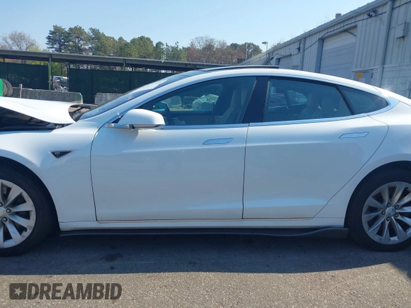 2016 Tesla Model S 90D with VIN 5YJSA1E26GF147327, listed as a IAAI auction lot 42077766 with 89,502 mi miles and . Bid and sale history available at DreamBid. Image 14.