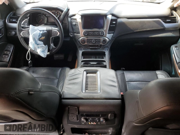 2015 Chevrolet Tahoe LTZ z VIN 1GNSKCKC4FR626030, wystawiony jako Copart lot #56280805 z przebiegiem Nie podano mil oraz Szkoda całkowita • Salvage title. Historia ofert i sprzedaży dostępna na DreamBid. Obrazek 8.