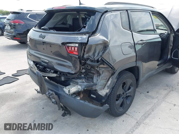 2018 Jeep Compass Latitude with VIN 3C4NJDBB1JT402381, listed as a IAAI auction lot 41844313 with 67,918 mi miles and . Bid and sale history available at DreamBid. Image 6.