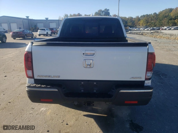 2020 Honda Ridgeline RTL-E with VIN 5FPYK3F77LB002473, listed as a Copart auction lot 77117414 with 62,631 mi miles and Salvage Title. Bid and sale history available at carsss.com. Image 6.