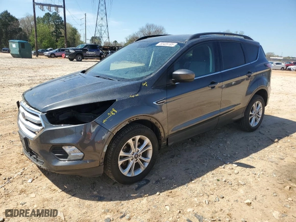 2018 Ford Escape SE with VIN 1FMCU0GD4JUD14296, listed as a Copart auction lot 50409185 with 80,700 mi miles and Salvage Title. Bid and sale history available at carsss.com. Image 1.