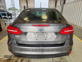 2018 Ford Focus SE with VIN 1FADP3FE0JL311760, listed as a Copart auction lot 63621755 with 81,000 mi miles and Salvage title. Bid and sale history available at DreamBid. Image 6.