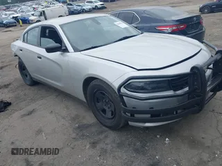 2019 Dodge Charger Police with VIN 2C3CDXAT0KH558288, listed as a IAAI auction lot 42068936 with 164,154 mi miles and . Bid and sale history available at DreamBid. Image 1.