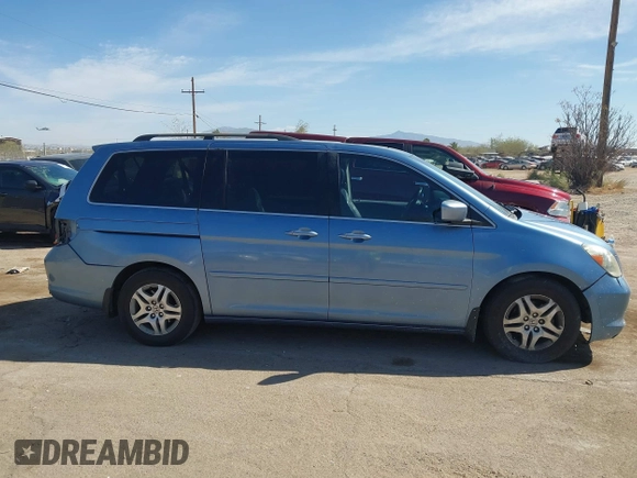 2006 Honda Odyssey EX-L with VIN 5FNRL38796B099851, listed as a IAAI auction lot 41555109 with 154,707 mi miles and . Bid and sale history available at DreamBid. Image 14.