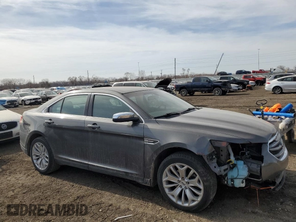 2015 Ford Taurus Limited with VIN 1FAHP2F8XFG102824, listed as a Copart auction lot 49475335 with 206,394 mi miles and Salvage Title. Bid and sale history available at DreamBid. Image 4.