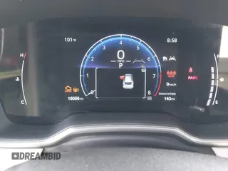 2023 Toyota Corolla Cross XLE z VIN 7MUDAAAG0PV065993, wystawiony jako IAAI lot #42629443 z przebiegiem 16 056 mil mil oraz . Historia ofert i sprzedaży dostępna na DreamBid. Obrazek 7.