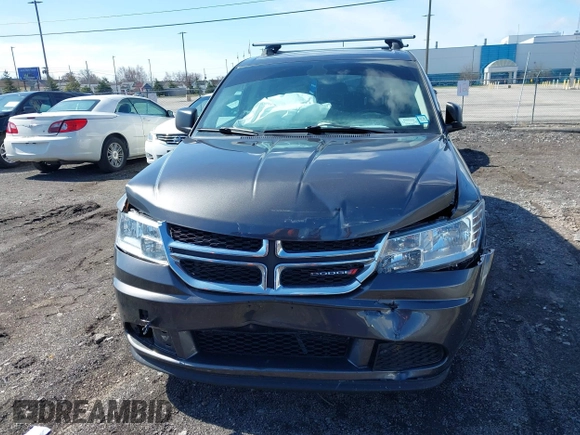 2018 Dodge Journey SE with VIN 3C4PDCAB3JT506088, listed as a IAAI auction lot 41969875 with 47,567 mi miles and . Bid and sale history available at carsss.com. Image 6.