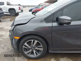2021 Honda Odyssey Touring with VIN 5FNRL6H86MB021504, listed as a IAAI auction lot 41550040 with 55,068 mi miles. Bid and sale history available at carsss.com. Image 19.