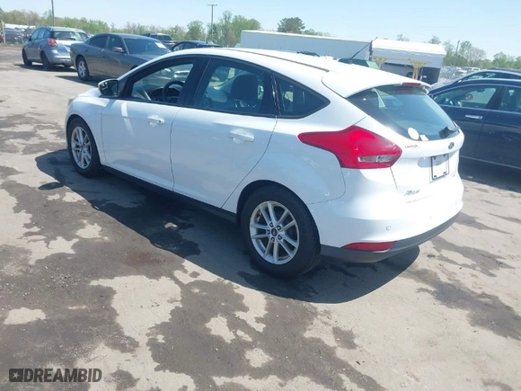 2015 Ford Focus SE with VIN 1FADP3K21FL246601, listed as a IAAI auction lot 41985398 with 139,782 mi miles. Bid and sale history available at carsss.com. Image 3.