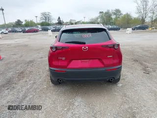 2023 Mazda CX-30 S Premium with VIN 3MVDMBDM3PM511402, listed as a IAAI auction lot 42180001 with 6,189 mi miles and . Bid and sale history available at DreamBid. Image 17.