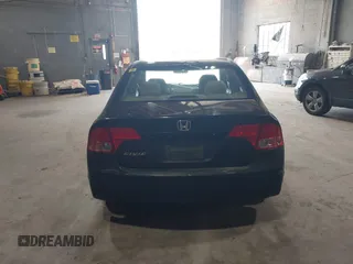 2006 Honda Civic LX z VIN 1HGFA165X6L103659, wystawiony jako IAAI lot #42579482 z przebiegiem 201 436 mil mil oraz . Historia ofert i sprzedaży dostępna na DreamBid. Obrazek 16.
