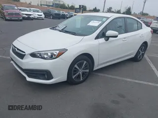 2021 Subaru Impreza Premium with VIN 4S3GKAV61M3604298, listed as a IAAI auction lot 42011198 with 50,667 mi miles and . Bid and sale history available at DreamBid. Image 2.