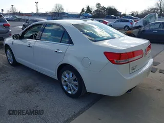 2012 Lincoln MKZ with VIN 3LNHL2JC4CR831614, listed as a IAAI auction lot 41883378 with 92,819 mi miles. Bid and sale history available at carsss.com. Image 3.