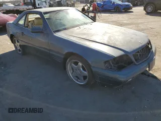 1999 Mercedes-Benz SL-Class with VIN WDBFA68F9XF175145, listed as a Copart auction lot 42160385 with 221,036 mi miles and Salvage Title. Bid and sale history available at carsss.com. Image 4.