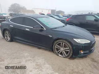 2015 Tesla Model S 85D with VIN 5YJSA1E24FF111120, listed as a IAAI auction lot 41471698 with 58,126 mi miles. Bid and sale history available at carsss.com. Image 1.