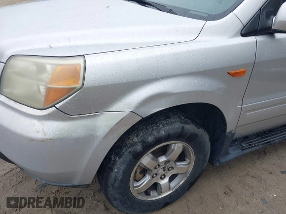 2006 Honda Pilot EX-L with VIN 2HKYF18606H513308, listed as a IAAI auction lot 42187787 with 185,716 mi miles and . Bid and sale history available at DreamBid. Image 17.