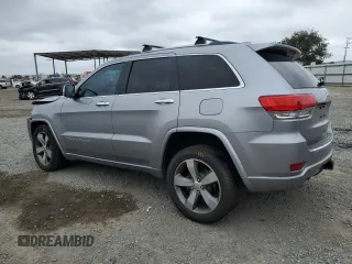2015 Jeep Grand Cherokee Overland with VIN 1C4RJECG4FC808241, listed as a Copart auction lot 59699685 with 67,542 mi miles and Salvage title. Bid and sale history available at DreamBid. Image 2.