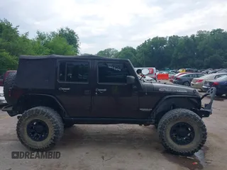 2013 Jeep Wrangler Unlimited Rubicon with VIN 1C4BJWFG5DL652050, listed as a IAAI auction lot 42451954 with 107,110 mi miles and . Bid and sale history available at DreamBid. Image 13.
