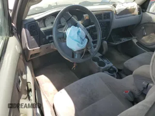 2004 Toyota Tacoma z VIN 5TEVL52N14Z401940, wystawiony jako Copart lot #55257905 z przebiegiem 288 990 mil mil oraz Szkoda całkowita • Salvage title. Historia ofert i sprzedaży dostępna na DreamBid. Obrazek 8.