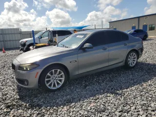 2015 BMW 5 Series 535i with VIN WBA5B1C50FD919900, listed as a Copart auction lot 61856295 with 125,052 mi miles and Salvage title. Bid and sale history available at DreamBid. Image 1.
