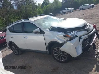 2017 Toyota RAV4 Limited with VIN 2T3YFREV8HW322208, listed as a IAAI auction lot 41974231 with 74,027 mi miles. Bid and sale history available at carsss.com. Image 13.