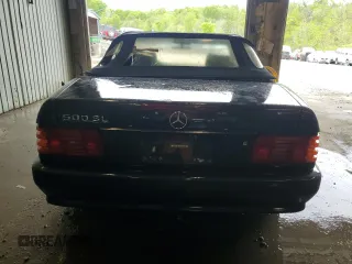 1992 Mercedes-Benz 500 z VIN WDBFA66E2NF038636, wystawiony jako Copart lot #55522605 z przebiegiem 92 002 mil mil oraz Szkody całkowita. Historia ofert i sprzedaży dostępna na DreamBid. Obrazek 6.