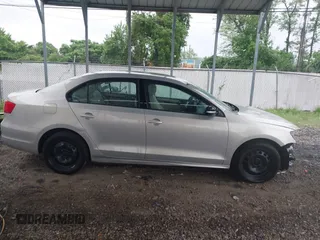 2012 Volkswagen Jetta SE with VIN 3VWDP7AJ9CM320638, listed as a IAAI auction lot 42227679 with 148,629 mi miles and . Bid and sale history available at DreamBid. Image 14.