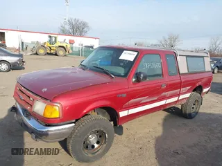 1997 Ford Ranger XLT with VIN 1FTCR14X2VPA39848, listed as a IAAI auction lot 38758650 with 145,617 mi miles. Bid and sale history available at carsss.com. Image 2.