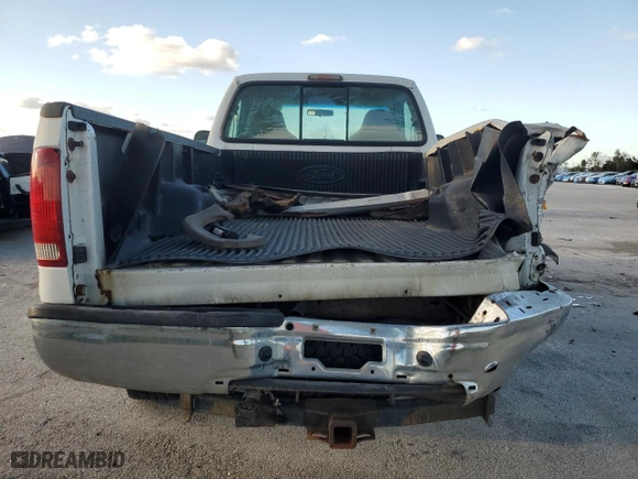 2006 Ford Super Duty F-250 XL with VIN 1FTNF21526ED78634, listed as a Copart auction lot 76741214 with 398,420 mi miles and Salvage Title. Bid and sale history available at carsss.com. Image 6.