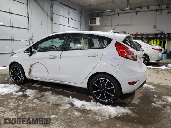 2016 Ford Fiesta SE with VIN 3FADP4EJ1GM148080, listed as a Copart auction lot 82866204 with 126,402 mi miles and Salvage Title. Bid and sale history available at DreamBid. Image 2.