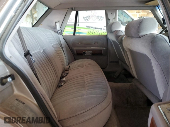 1990 Ford Crown Victoria z VIN 2FACP73F9LX166174, wystawiony jako Copart lot #76043234 z przebiegiem 52 545 mil mil oraz Szkoda całkowita • Salvage title. Historia ofert i sprzedaży dostępna na DreamBid. Obrazek 10.