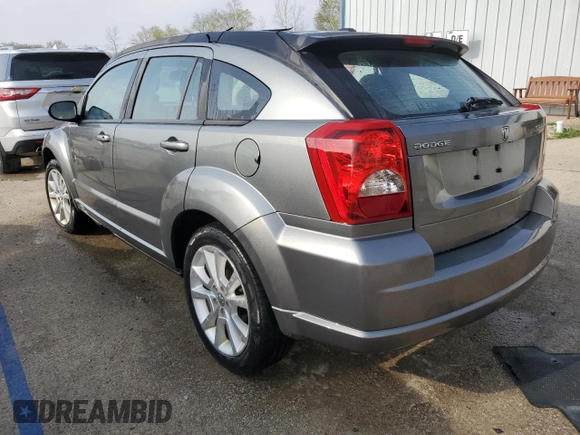 2011 Dodge Caliber Heat z VIN 1B3CB5HA4BD222393, wystawiony jako Copart lot #52901255 z przebiegiem 108 070 mil mil oraz Szkody całkowita. Historia ofert i sprzedaży dostępna na DreamBid. Obrazek 2.