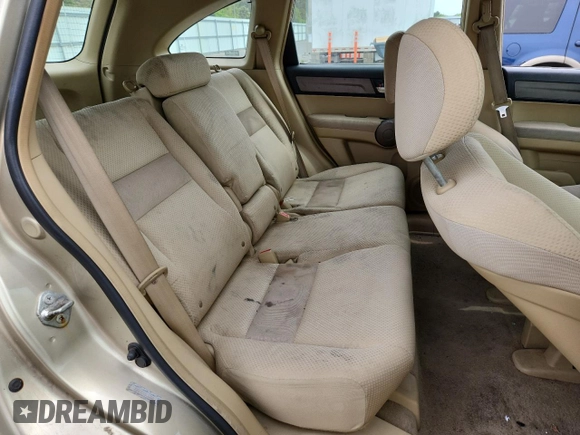 2009 Honda CR-V LX z VIN 5J6RE48309L006028, wystawiony jako Copart lot #58186465 z przebiegiem 214 896 mil mil oraz Szkoda całkowita • Salvage title. Historia ofert i sprzedaży dostępna na DreamBid. Obrazek 11.