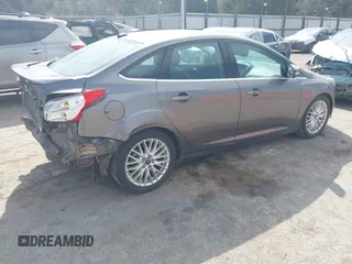 2014 Ford Focus Titanium with VIN 1FADP3J21EL299718, listed as a IAAI auction lot 41788080 with 91,748 mi miles. Bid and sale history available at carsss.com. Image 4.