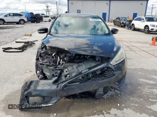 2015 Ford Focus SE with VIN 1FADP3F23FL242768, listed as a Copart auction lot 58068865 with 172,163 mi miles and Salvage title. Bid and sale history available at DreamBid. Image 5.