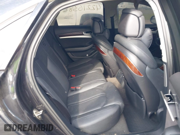 2012 Audi A8 with VIN WAUAVAFD8CN029546, listed as a IAAI auction lot 42216382 with 144,989 mi miles and . Bid and sale history available at DreamBid. Image 8.