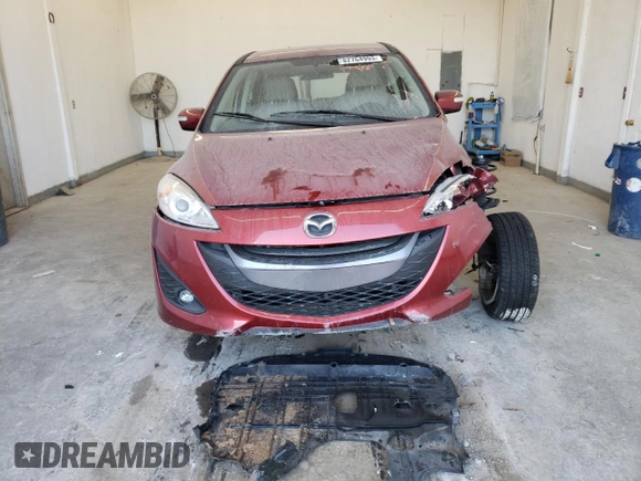 2015 Mazda 5 Touring with VIN JM1CW2CL7F0179885, listed as a Copart auction lot 82764993 with 31,306 mi miles and Salvage Title. Bid and sale history available at carsss.com. Image 5.