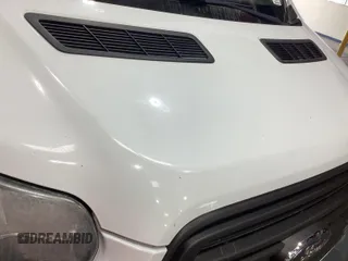 2015 Ford Transit Cargo with VIN 1FTNR1ZM1FKA44965, listed as a IAAI auction lot 42679340 with 151,641 mi miles and . Bid and sale history available at DreamBid. Image 37.