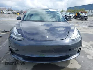 2022 Tesla Model 3 Long Range with VIN 5YJ3E1EB0NF259904, listed as a IAAI auction lot 41826642 with 42,272 mi miles and . Bid and sale history available at DreamBid. Image 12.