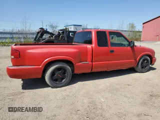 2000 GMC Sonoma SLS z VIN 1GTCS19W0Y8262960, wystawiony jako Copart lot #56512435 z przebiegiem 243 662 mil mil oraz Tytuł czysty. Historia ofert i sprzedaży dostępna na DreamBid. Obrazek 3.