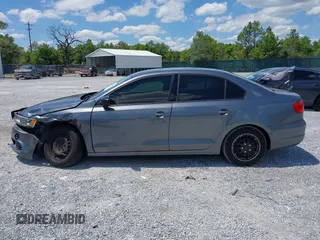 2014 Volkswagen Jetta S z VIN 3VW2K7AJ6EM253571, wystawiony jako IAAI lot #42186222 z przebiegiem 171 518 mil mil oraz . Historia ofert i sprzedaży dostępna na DreamBid. Obrazek 14.