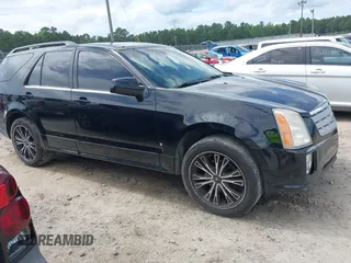 2006 Cadillac SRX z VIN 1GYEE637460202233, wystawiony jako IAAI lot #42433081 z przebiegiem 166 238 mil mil oraz . Historia ofert i sprzedaży dostępna na DreamBid. Obrazek 1.